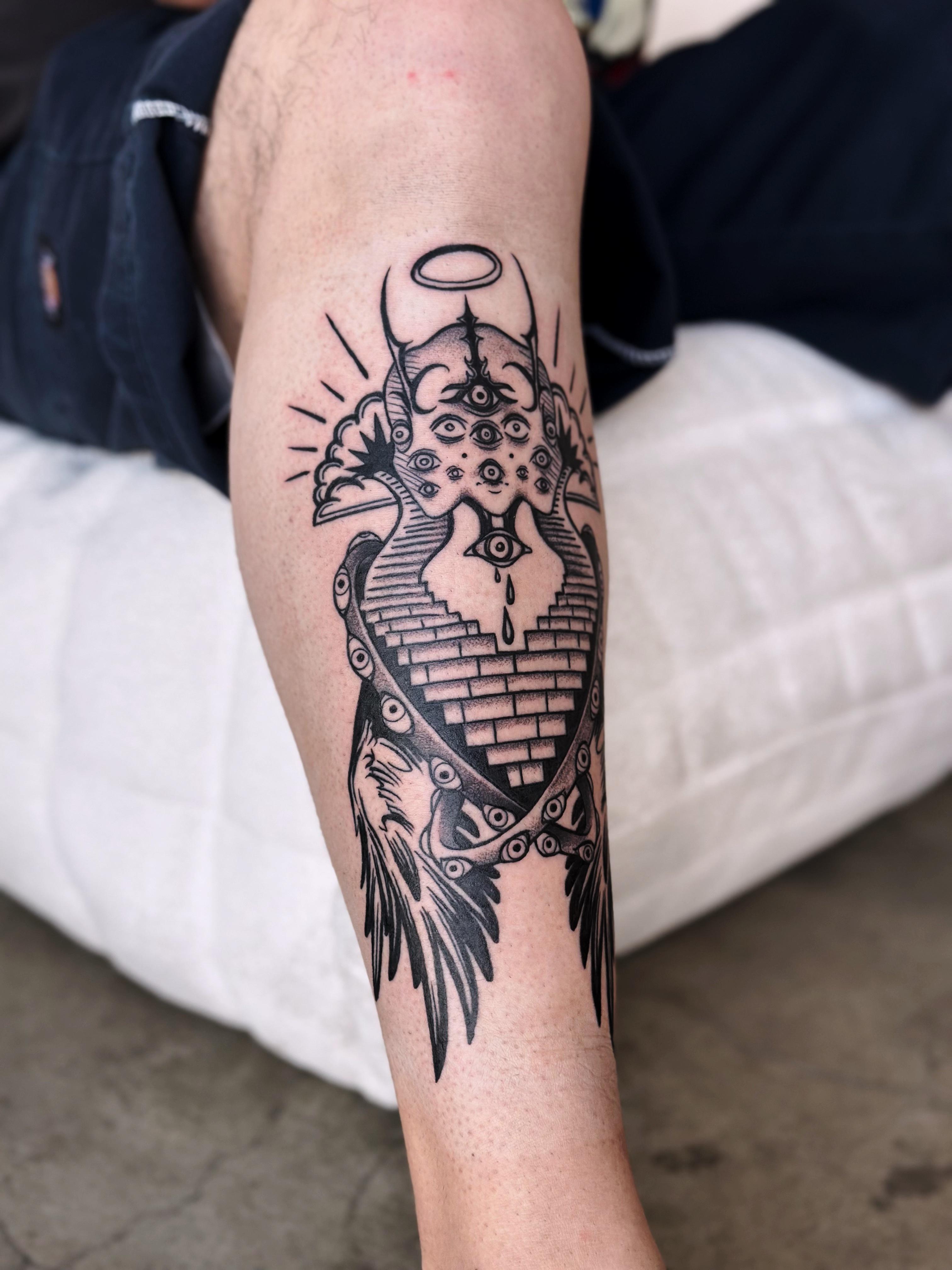 Black and grey angel eyes tattoo