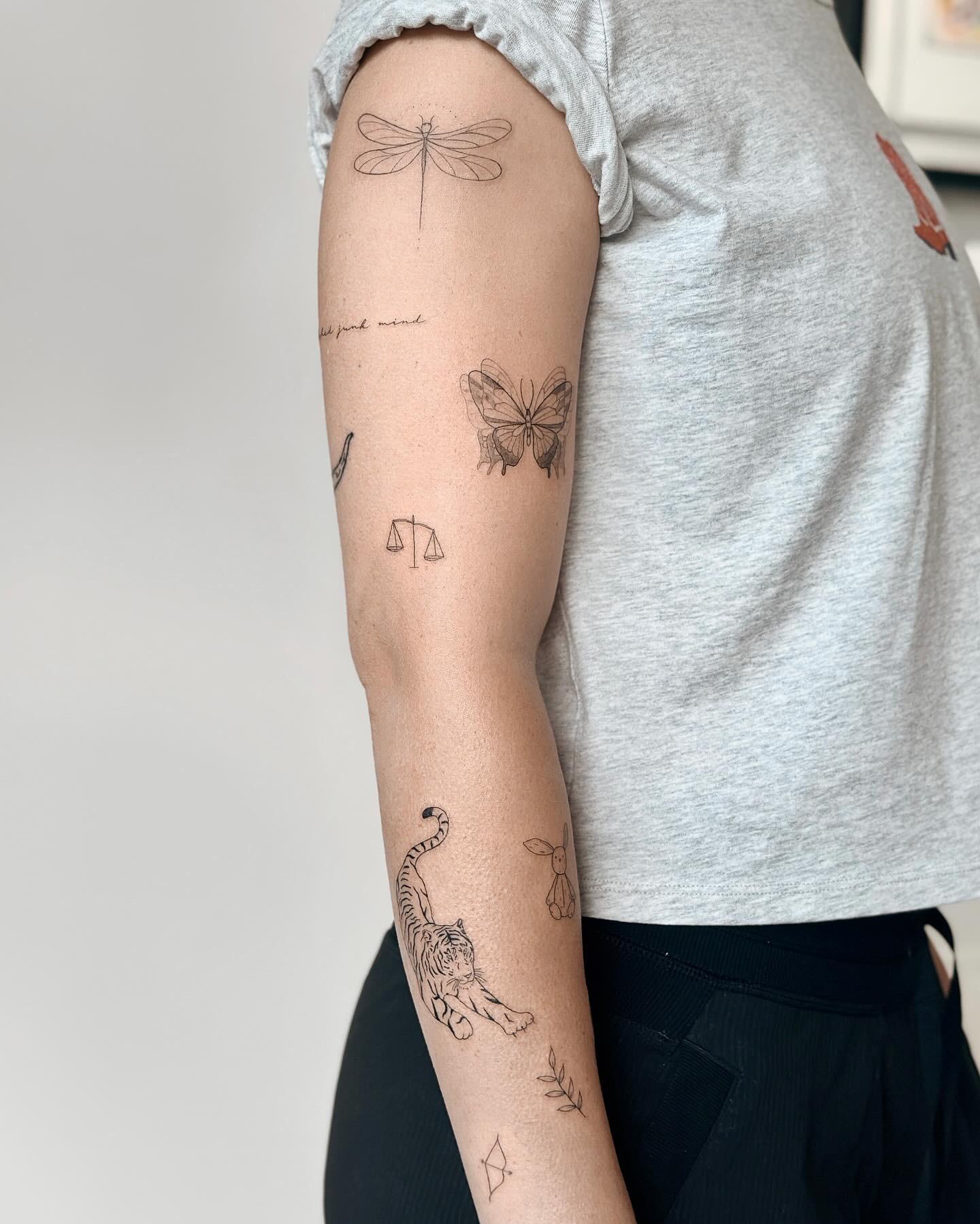 Fine line patchwork sleeve tattoos