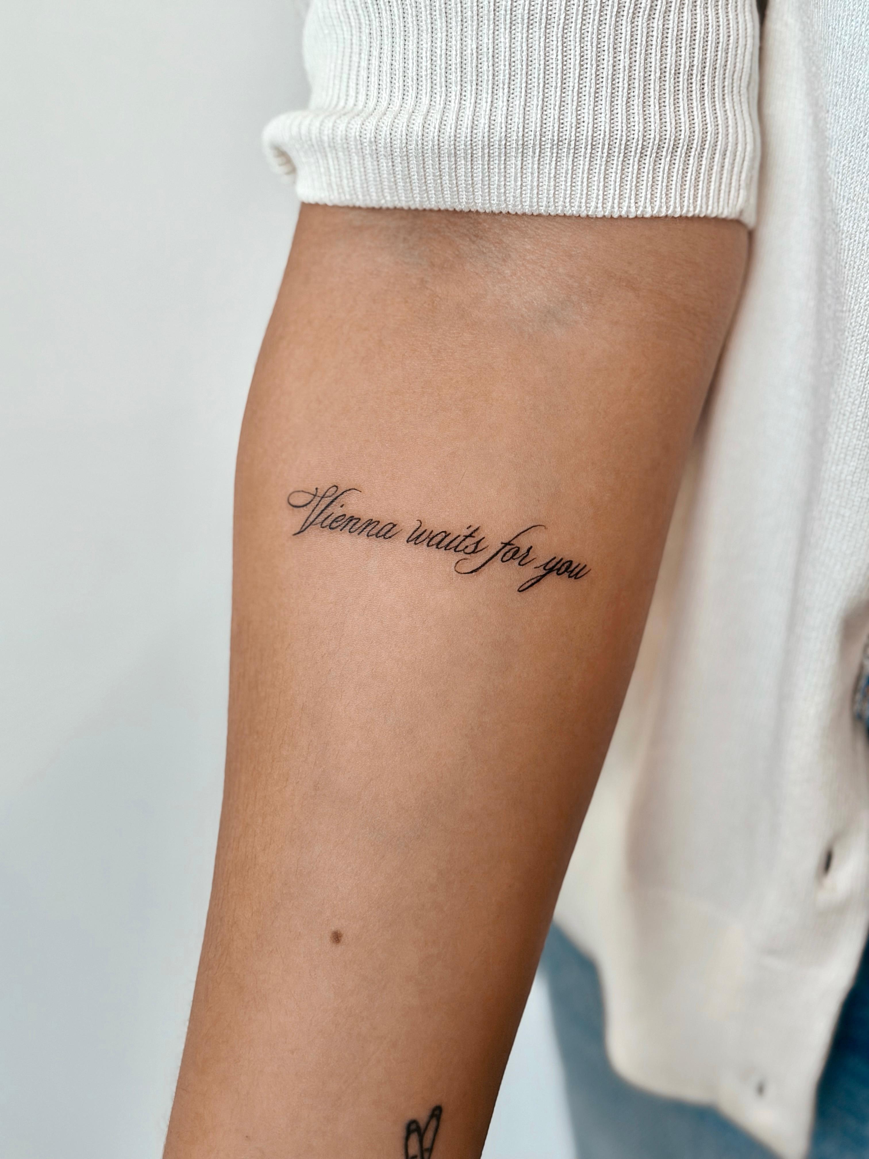 Vienna Waits for You lettering tattoo